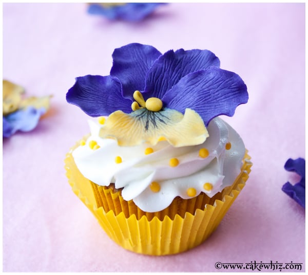 Easy Flower Cupcakes in Yellow Liners and Pink Background