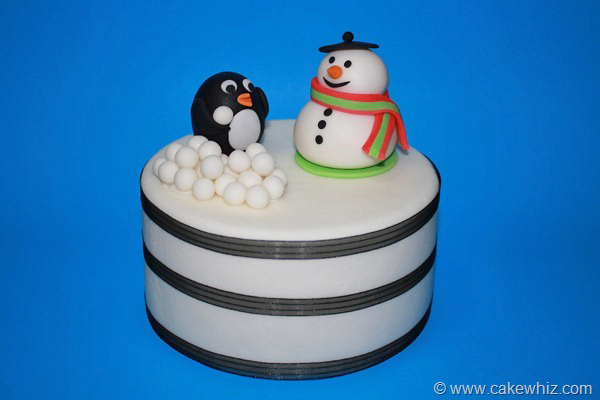 Winter Cake With Fondant Snowman Topper and Fondant Penguin Topper