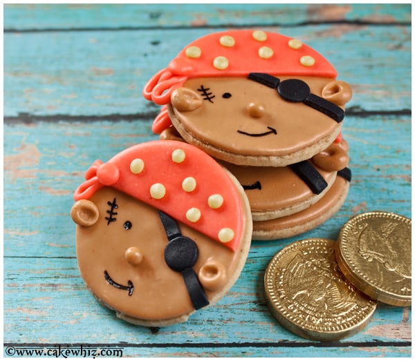 Homemade Fondant Decorated Cookies on Rustic Blue Background.