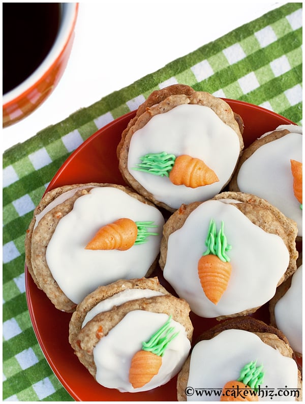 Decorated Carrot Cookies in Red Plate- Overhead Shot