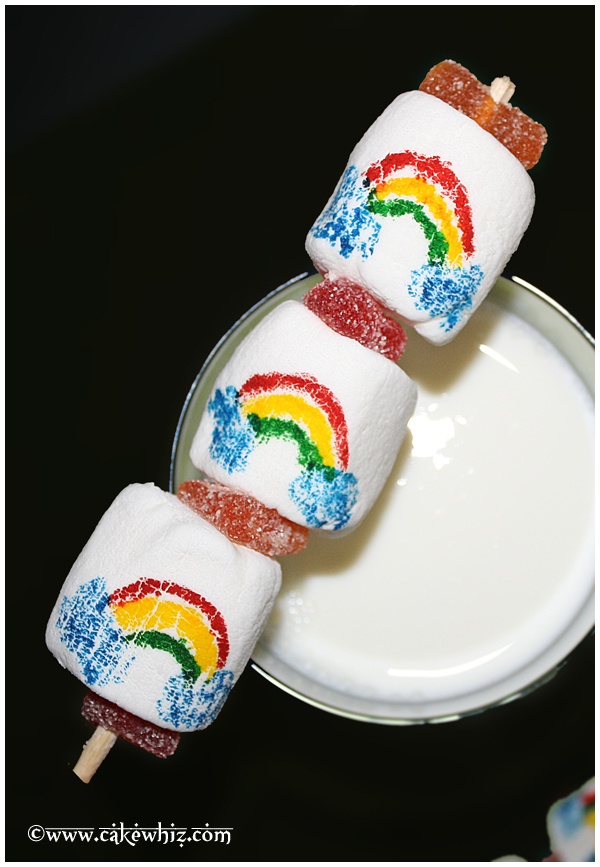 Rainbow Marshmallow Pops on Black Background