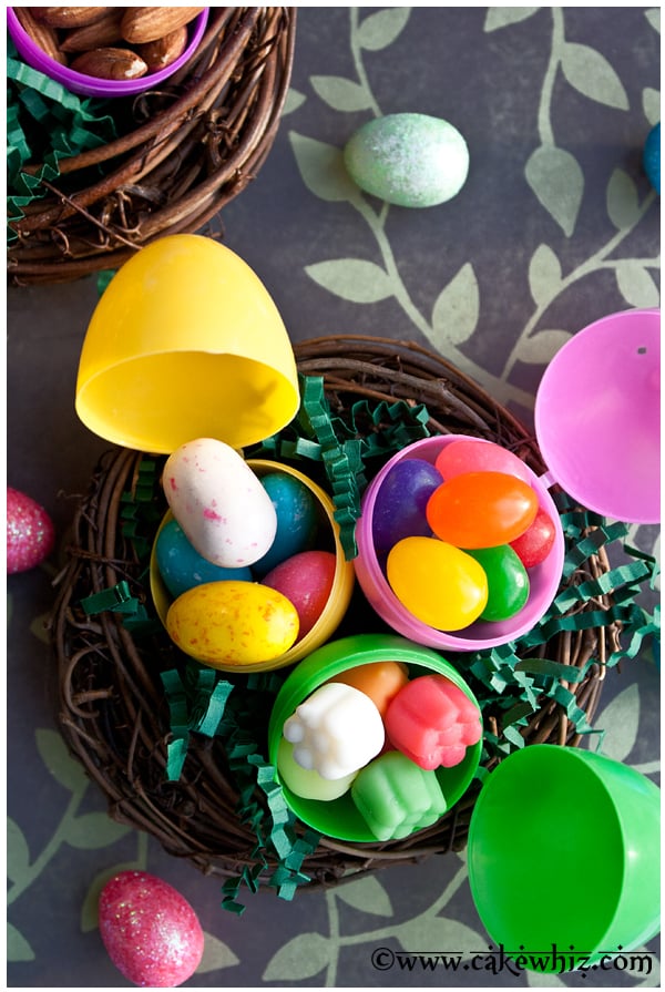 Opened Plastic Eggs With Various Filling Ideas- Overhead Shot