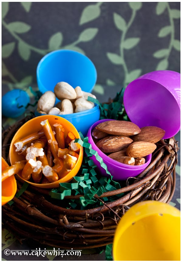 Plastic Eggs Filled With Nuts on Small Nest 