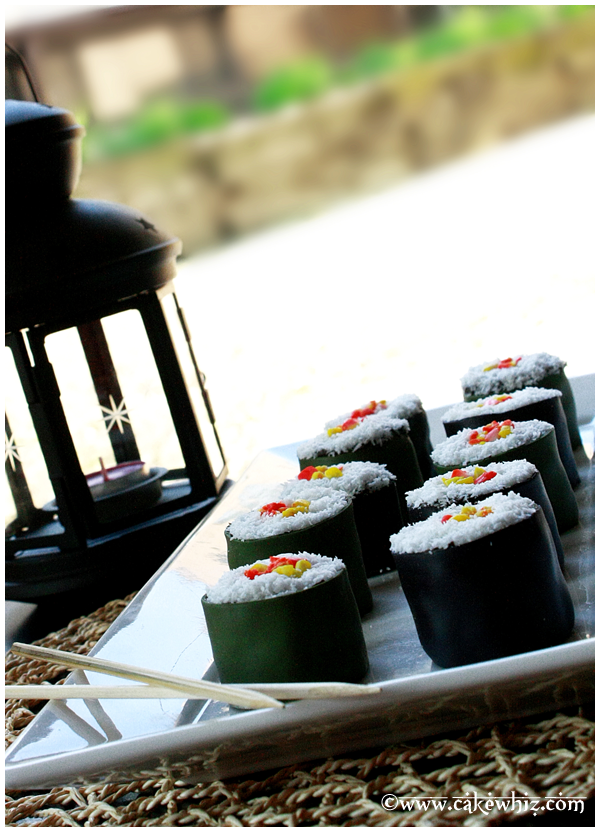 Easy Sushi Cake on White Tray With Lantern in Background