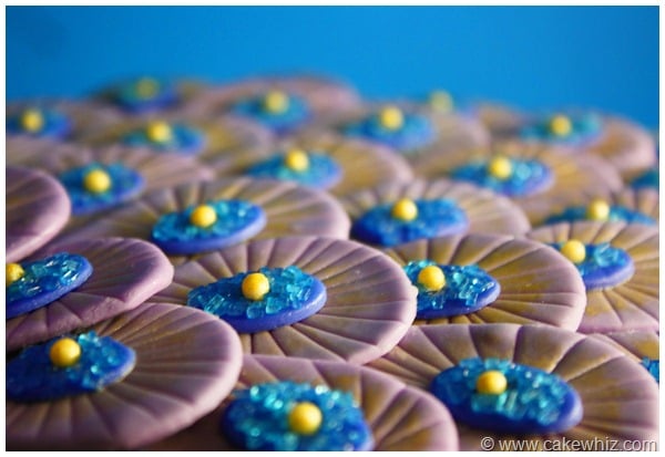 Closeup Shot of Fondant Peacock Feathers With Blue Background