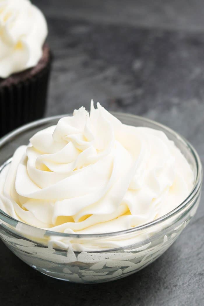 Fluffy White Frosting in Glass Bowl. 