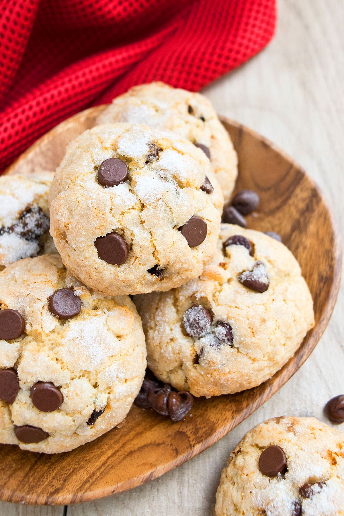 Easy Italian ricotta cookies on wooden dish. 