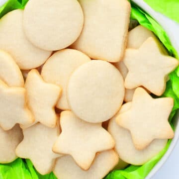 Easy Small Batch of Easy Cut Out Sugar Cookies in White Bowl With Green Liner.