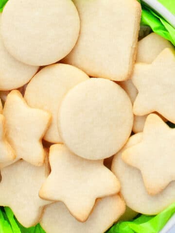 Easy Small Batch of Easy Cut Out Sugar Cookies in White Bowl With Green Liner.