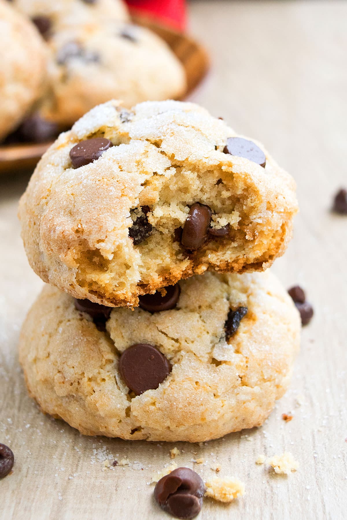 Stack of Cookies With One That is Partially Eaten on Wood Background. 