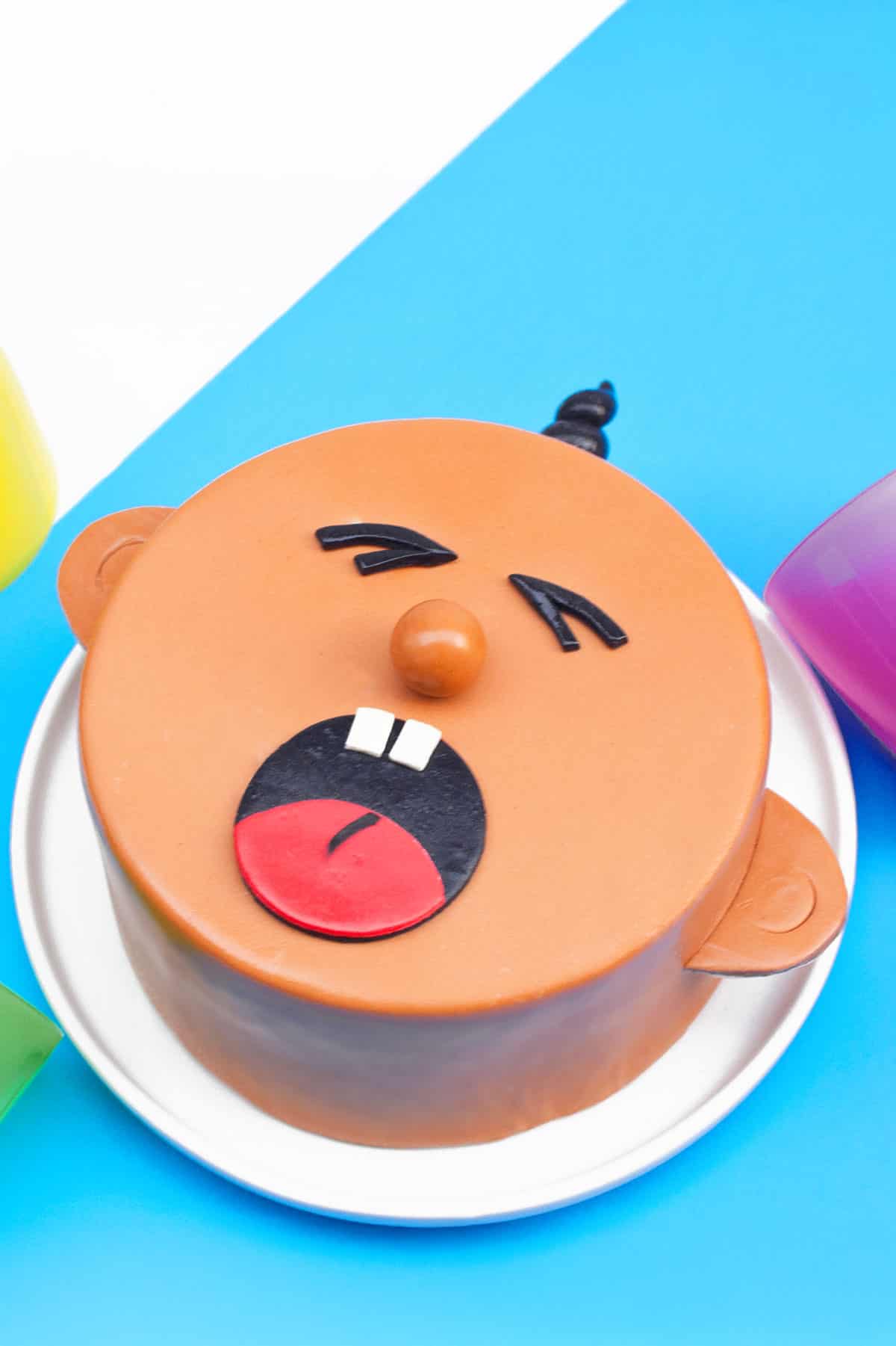 Fondant Decorated Cake on White Dish. 