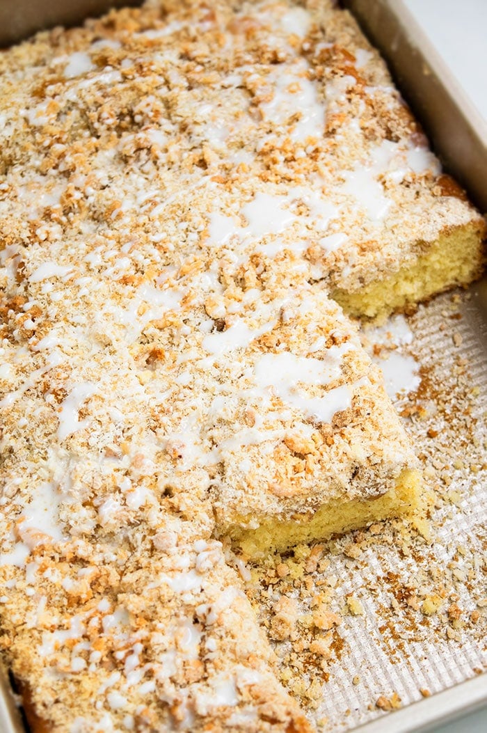 Fresh Apple Coffee Cake With Crumble Topping and Some Slices Removed. 