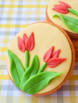 Easy Homemade Tulip Cookies Placed on a Checkered Background