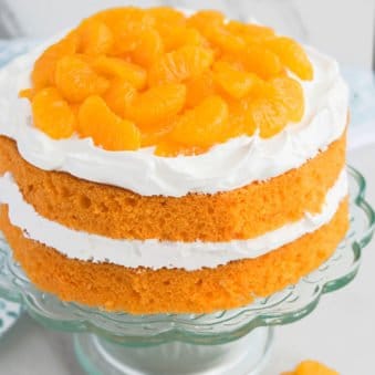 Easy Orange Cake With Cake Mix on Glass Cake Stand.