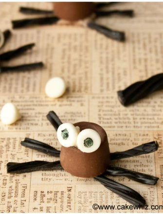Easy Edible Chocolate Spiders For Halloween on Rustic Brown Background