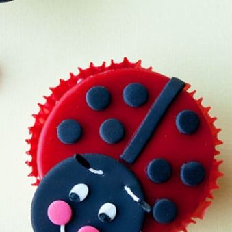 Easy Homemade Fondant Ladybug Cupcakes on Yellow Background