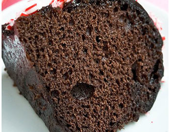 How to Make Box Cake Mix Taste Homemade Resulting in Perfect Slice of Cake on White Dish.