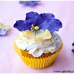 Easy Homemade Fondant Flower Cupcakes with Yellow Liner and Pink Background