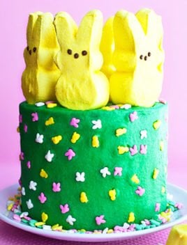 Easy Easter Peeps Cake on White Plate With Pink Background
