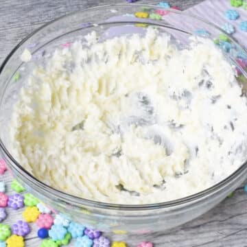 Butter and shortening creamed together in glass bowl. 