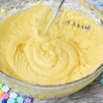 Hand held mixer mixing all the ingredients until smooth. 