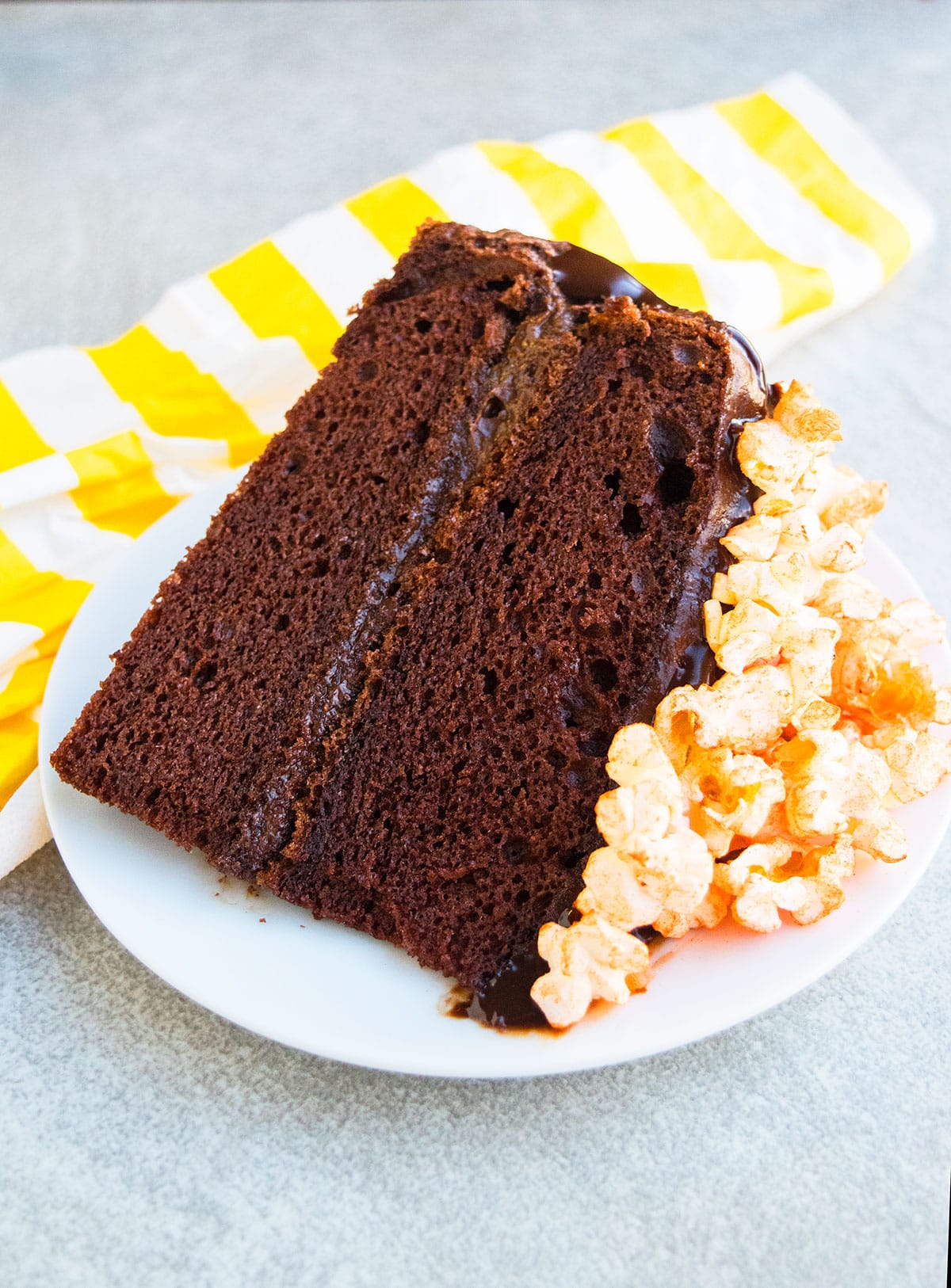 Slice of cake on white dish. 