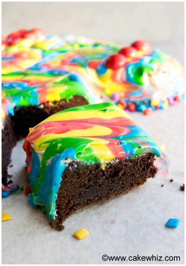 Slice of Chocolate Cake with Colorful Tie Dye Frosting