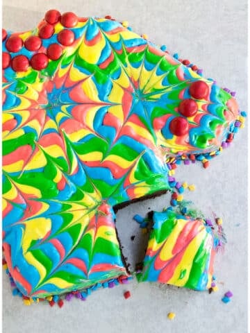 Homemade Tie Dye Cake With One Slice Cut Out