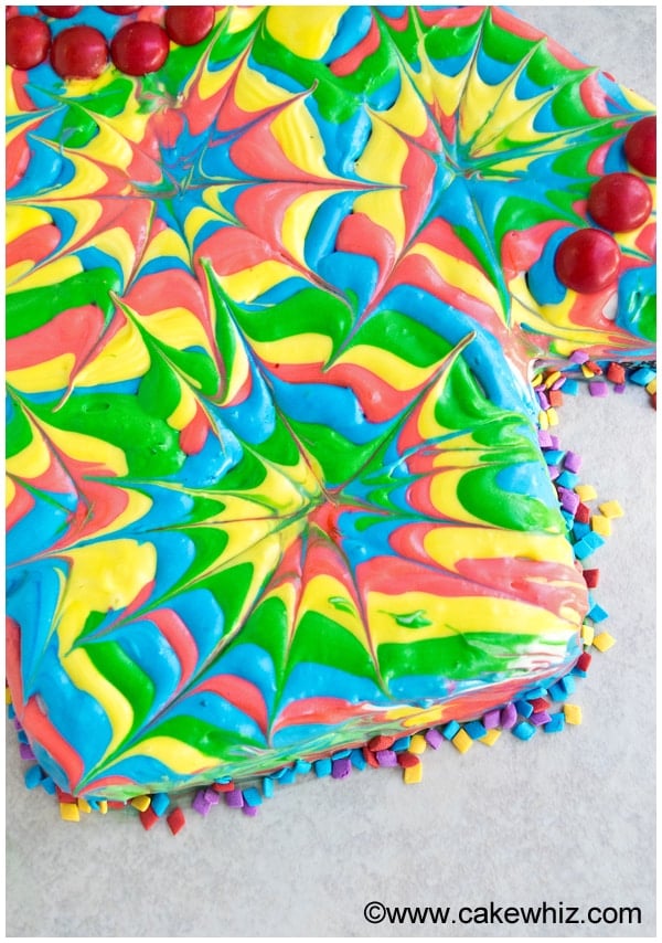 Closeup Shot of Tie Dye Frosting Design on Shirt Cake