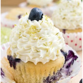 Easy Blueberry Cupcakes With Cream Cheese Frosting- Wrapper Peeled Away.