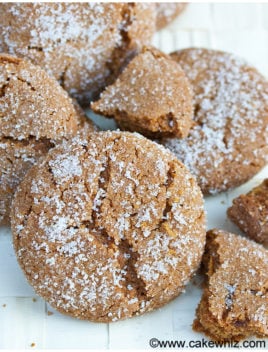Easy Soft and Chewy Molasses Cookies Pile on Textured Beige Background