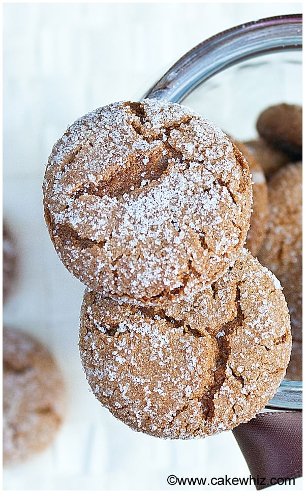 Soft and Chewy Molasses Crinkle Cookies on Top of Glass Jar