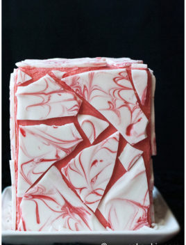 Easy Chocolate Bark Cake on White Dish With Black Background