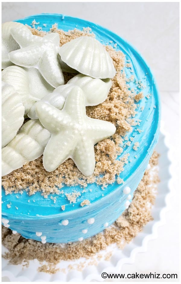 Homemade Beach Theme Cake on White Cake Stand