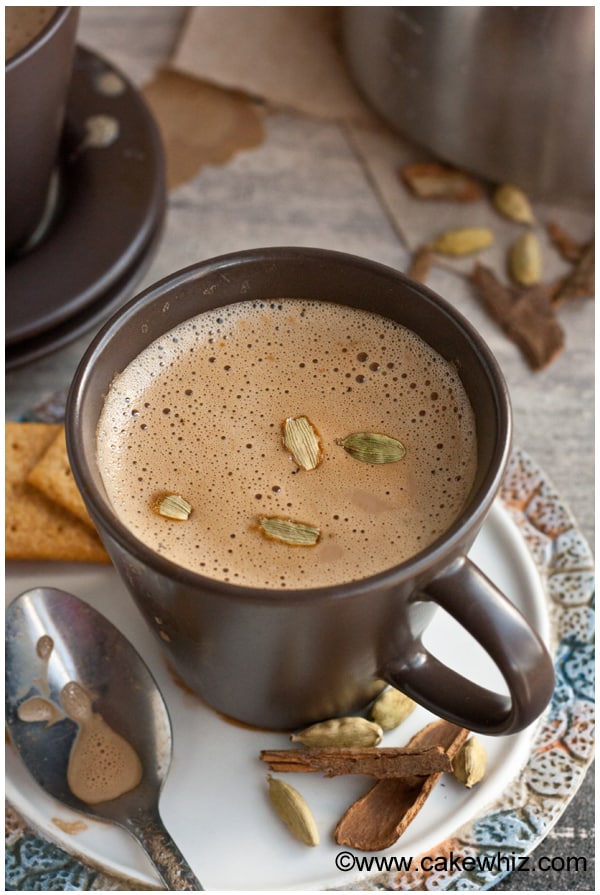 Easy Masala Chai Tea in Brown Cup on Rustic Background