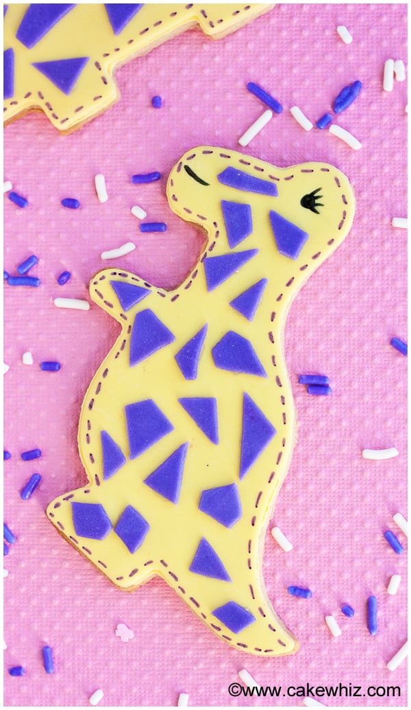 Easy Dinosaur Cookies on Pink Background With Sprunkles
