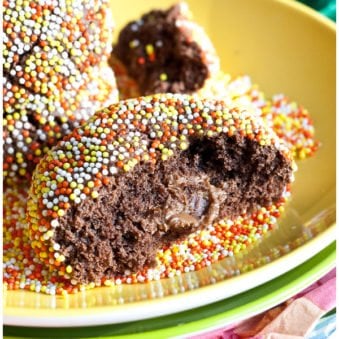 Easy Stuffed Chocolate Rolo Cookies on Yellow Plate-Partially Eaten