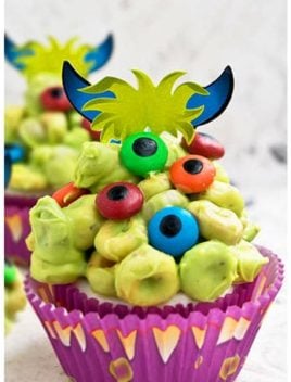 Easy Homemade Halloween Monster Cupcakes on Rustic Background