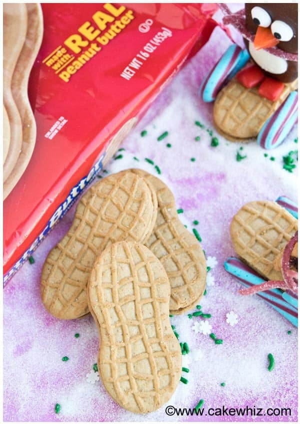 Nutter Butter Cookies on a Pink Background with Sugar 