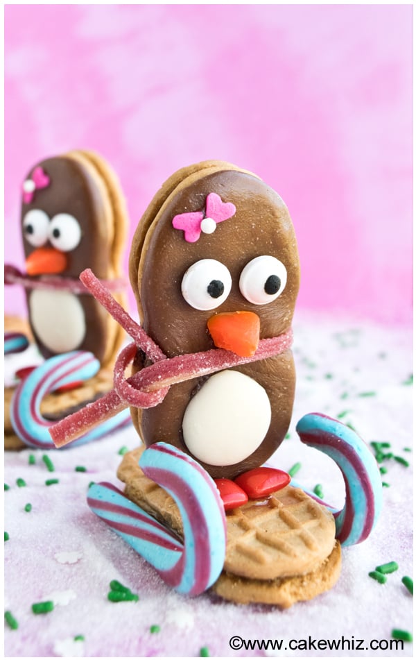 Easy Penguin Cookies on Pink Background