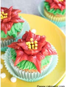 Easy Poinsettia Cupcakes With Buttercream Icing on Yellow Plate