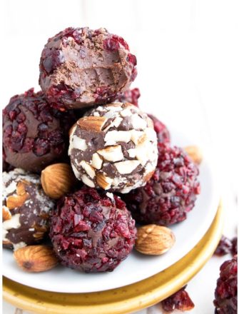 Easy Homemade Chocolate Truffles Stacked on White Dish