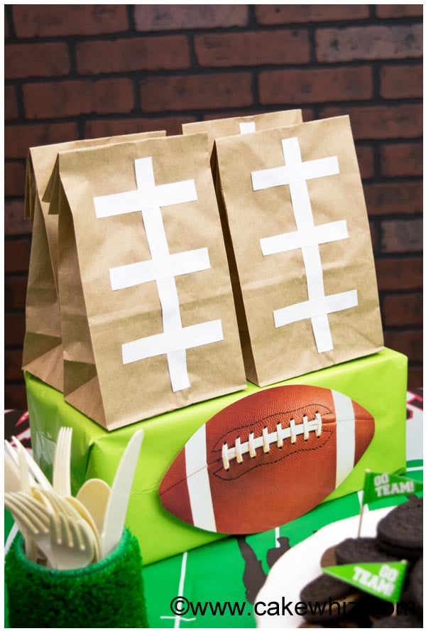 Football Party Goodie Bags Displayed on Dessert Table