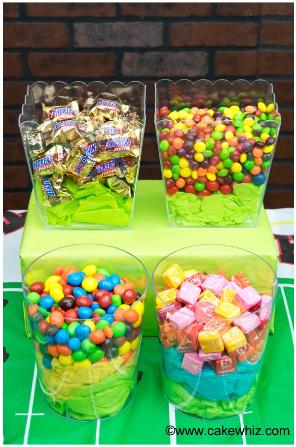 Clear Containers With Candies at Sports Party
