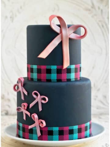 Easy Fondant Bows Decorated on Tiered Gray Cake