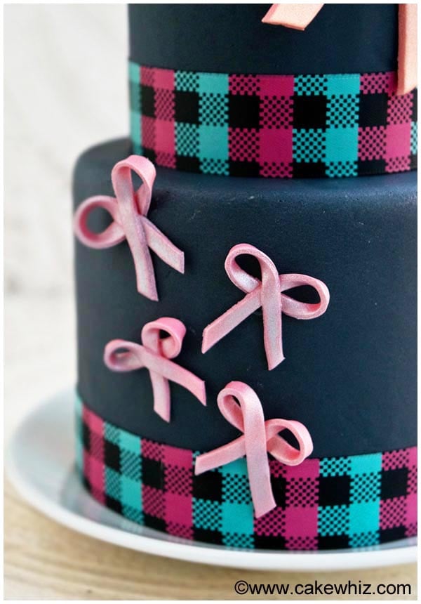 Closeup Shot of Pink and Gray Tiered Cake