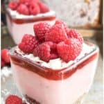 Easy Raspberry Mousse in Glass Cup With Brownie Bottom on Rustic Background