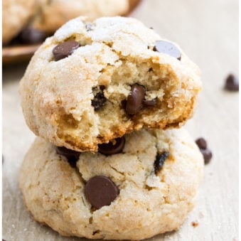 Stack of Easy Ricotta Cheese Cookies With Chocolate Chips on Wood Background.