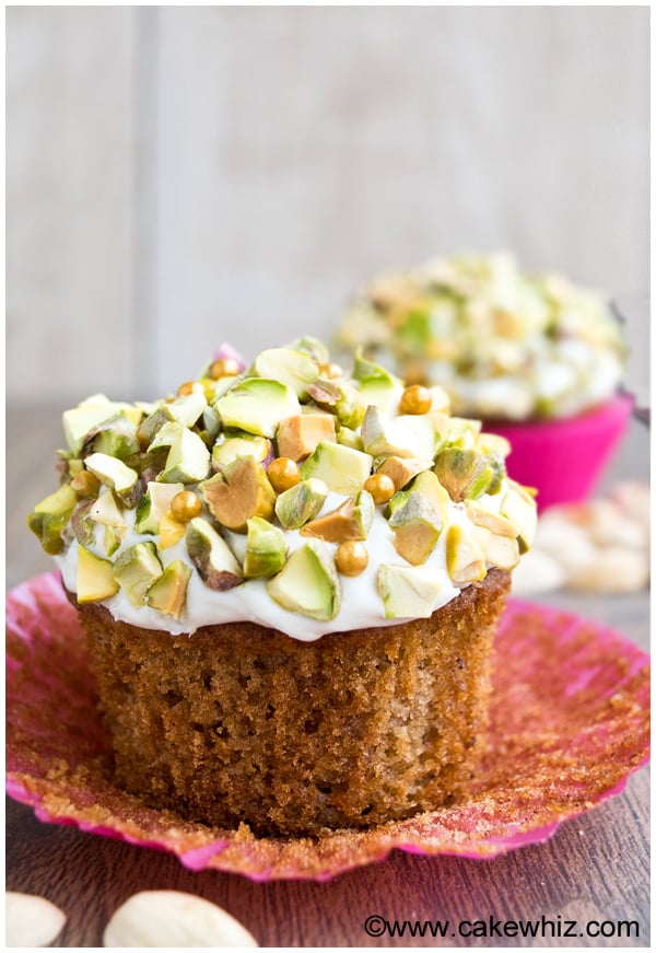 Moist Cupcakes With Cream Cheese Icing and Pistachios