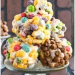 Stack of Easy Homemade Rainbow Cereal Balls on Glass Cake Stand